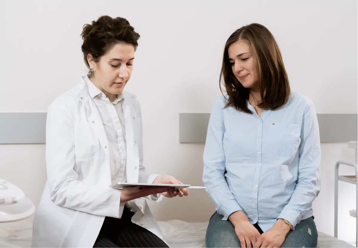 a doctor talking to a patient